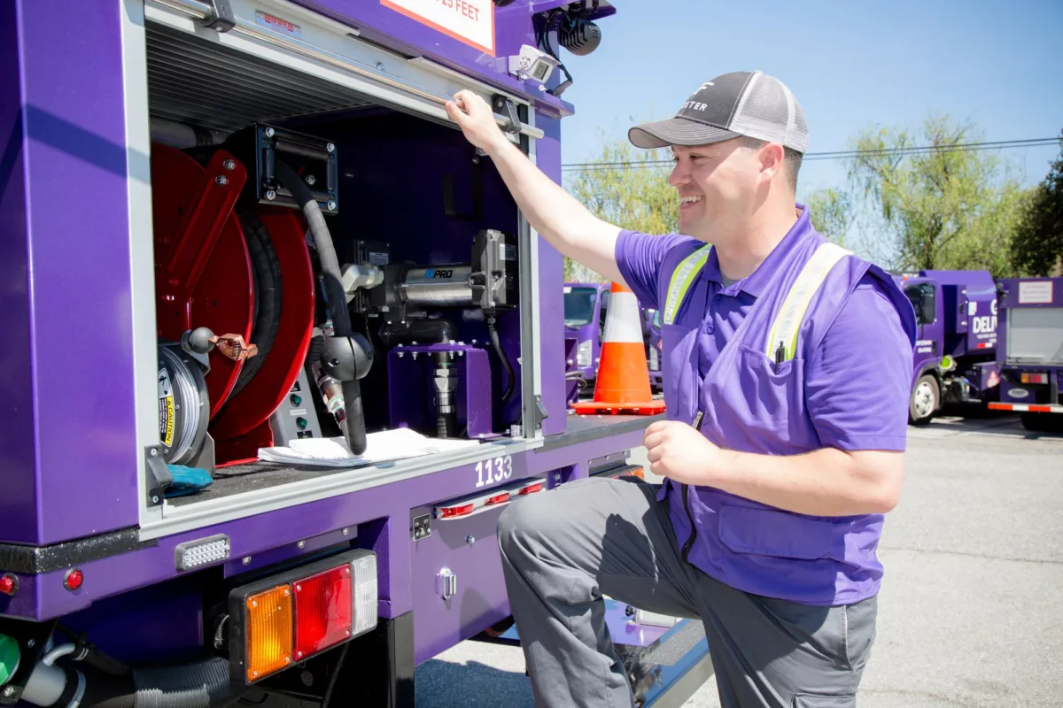 White male booster delivery driver opening truck