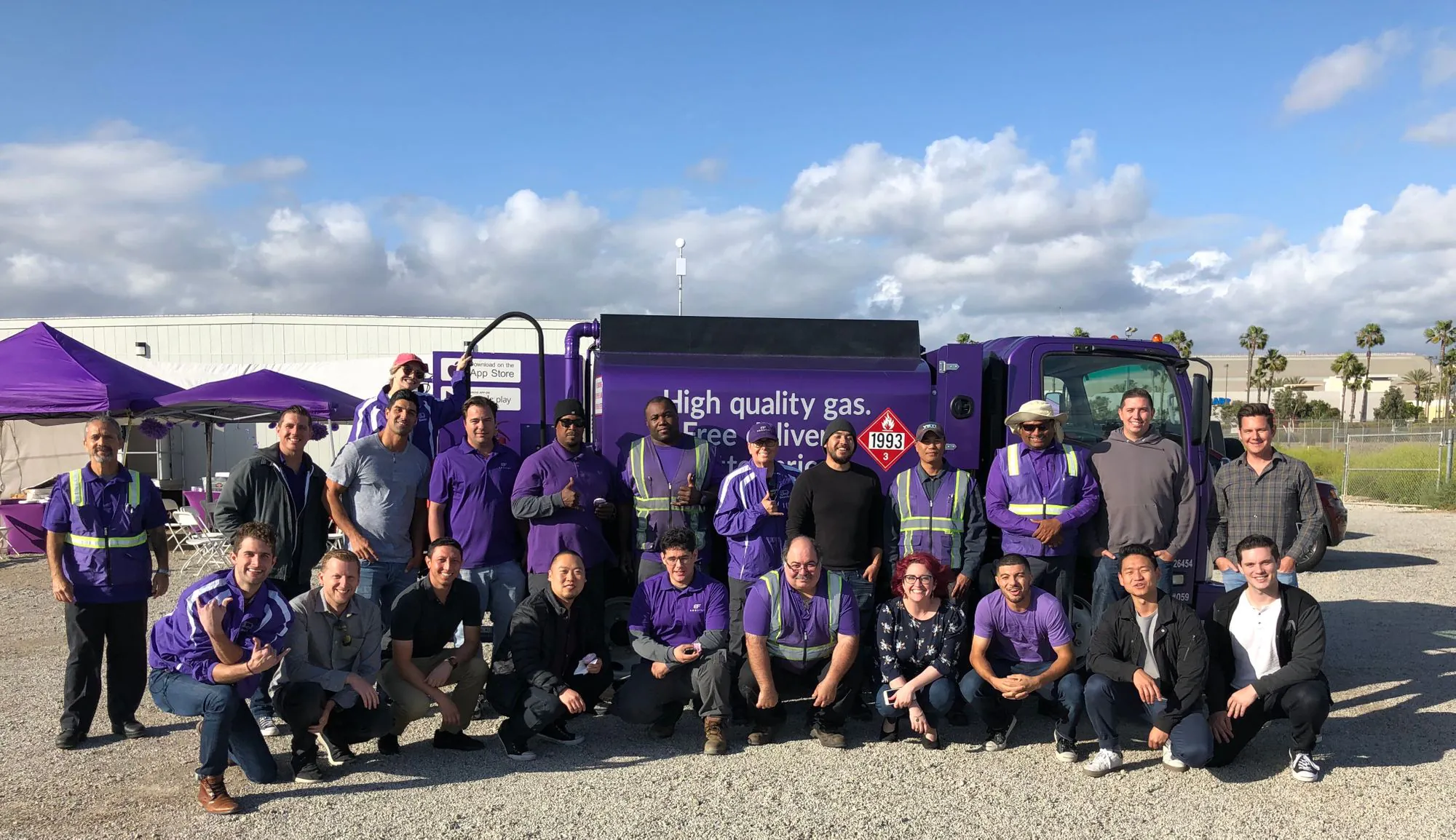 Booster team photo beside truck