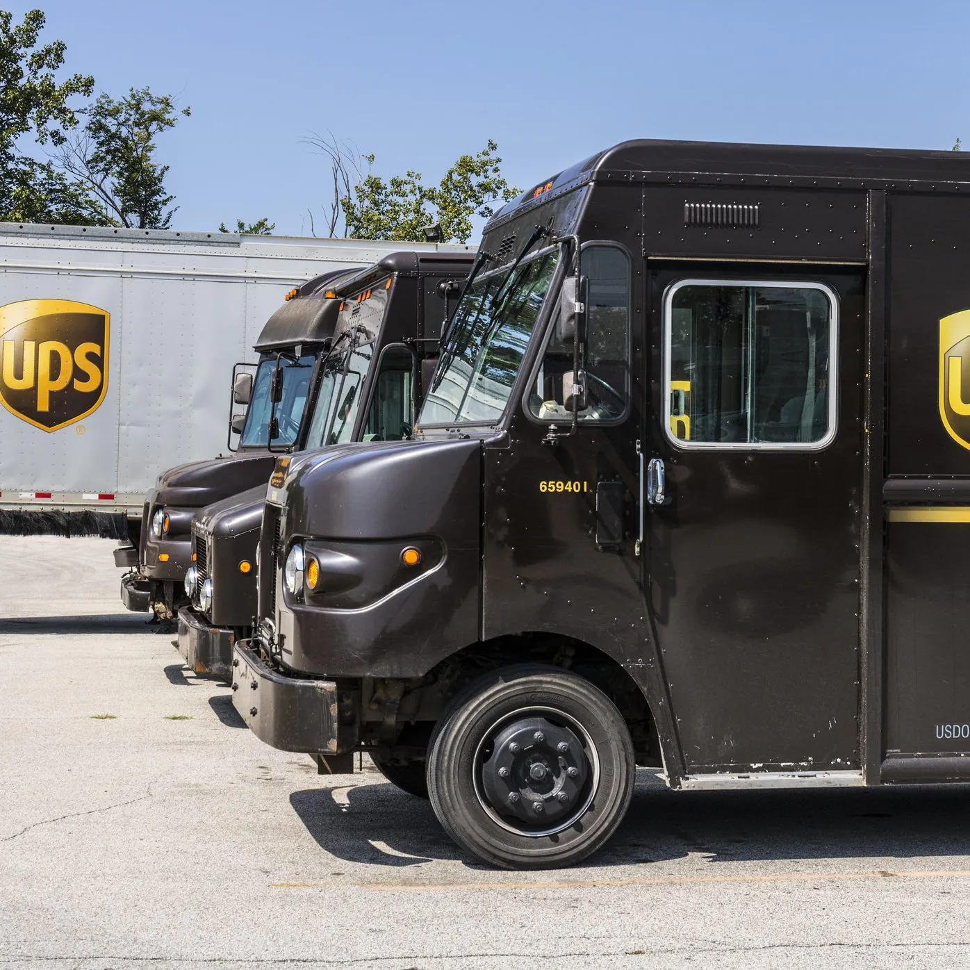 UPS trucks in parking lot