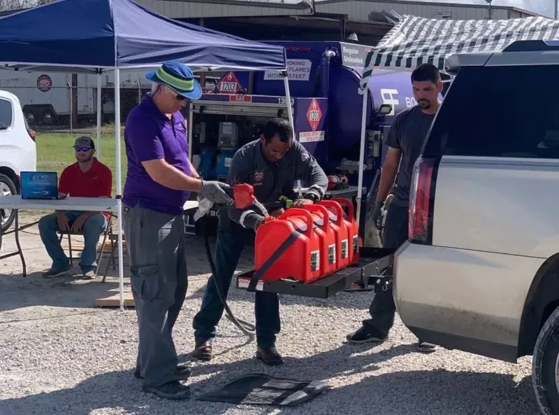mobile fuel emergency delivery with gas cans