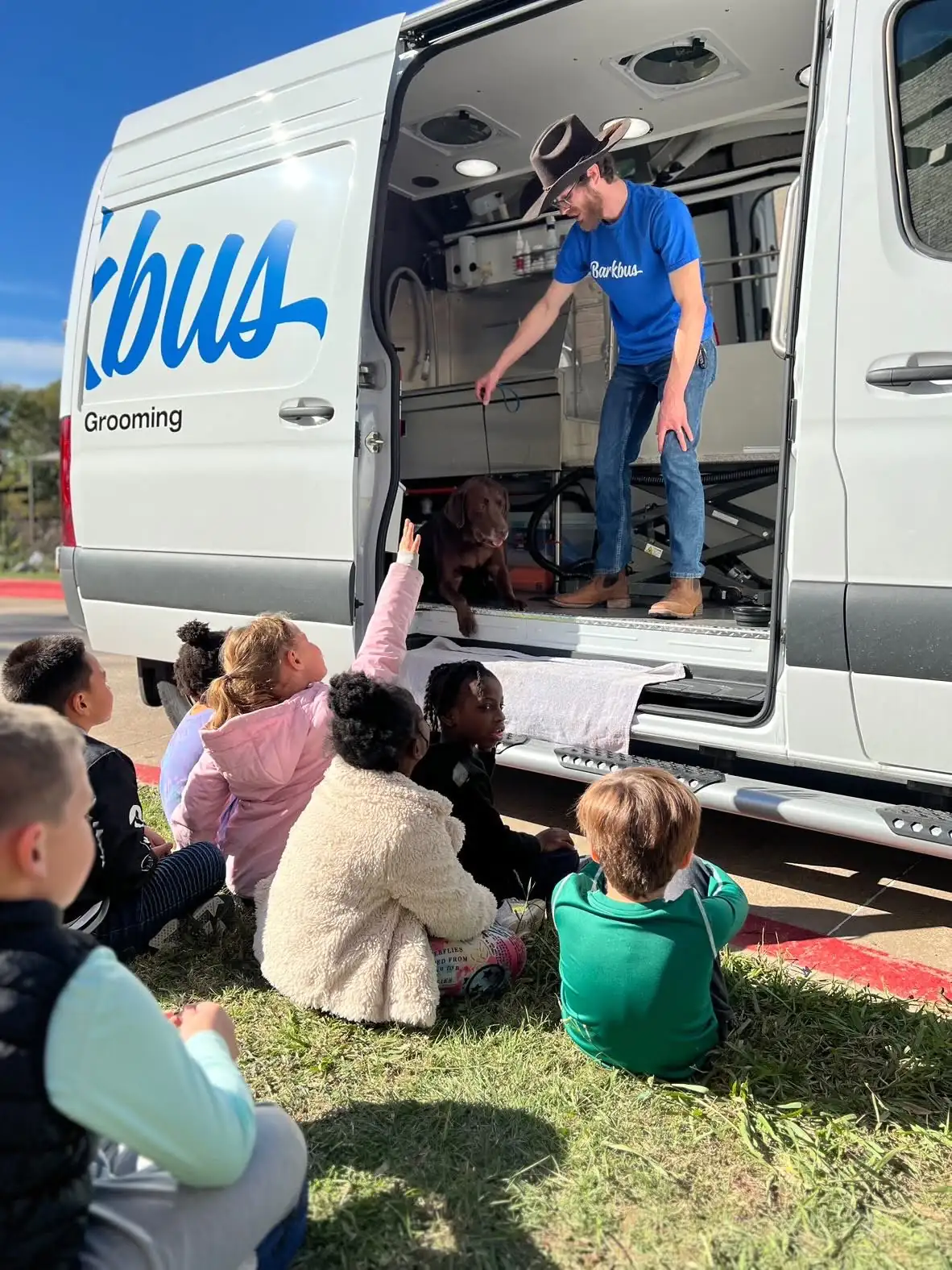 man exiting white delivery van